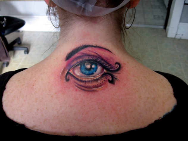 back of the neck eye tattoo